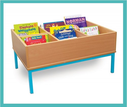 Books stored in a large wooden box