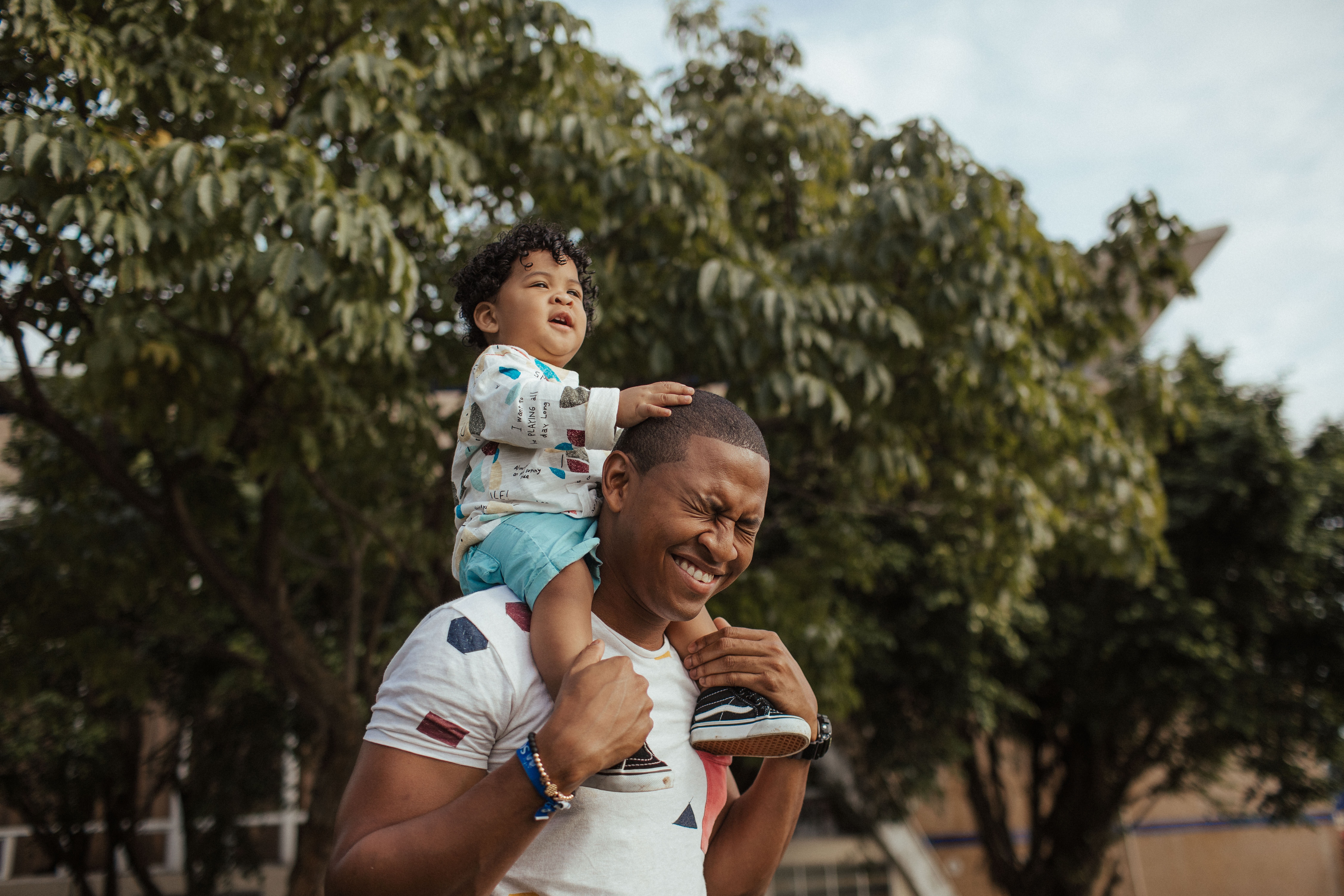 A dad and toddler out for a walk