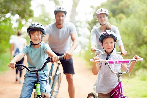 a family on a bike ride together